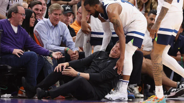 Timberwolves Coach Chris Finch Suffers Torn Patellar Tendon After Collision with Mike Conley - Seasports